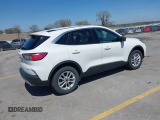 2022 Ford Escape SE with VIN 1FMCU9G69NUA61133, listed as a IAAI auction lot 42077406 with 218,074 mi miles. Bid and sale history available at carsss.com. Image 4.
