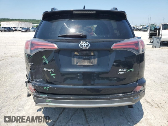 2018 Toyota RAV4 XLE z VIN 2T3RFREV4JW812199, wystawiony jako Copart lot #58485725 z przebiegiem 96 576 mil mil oraz Szkoda całkowita • Salvage title. Historia ofert i sprzedaży dostępna na DreamBid. Obrazek 6.
