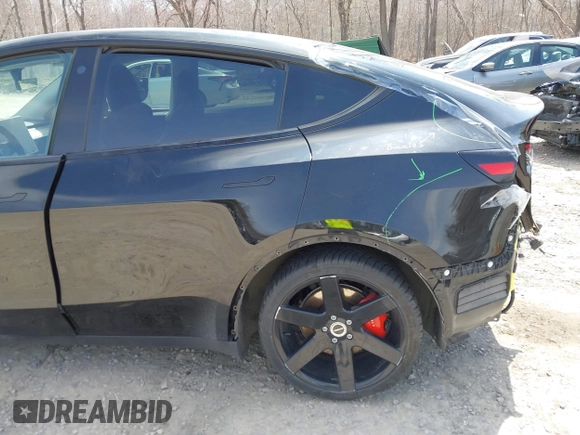 2022 Tesla Model Y Performance with VIN 7SAYGDEF7NF310113, listed as a IAAI auction lot 42038407 with 46,052 mi miles and . Bid and sale history available at DreamBid. Image 6.