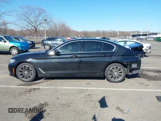 2019 BMW 5 Series 530i xDrive with VIN WBAJA7C50KG910787, listed as a IAAI auction lot 41761104 with 65,018 mi miles. Bid and sale history available at carsss.com. Image 14.