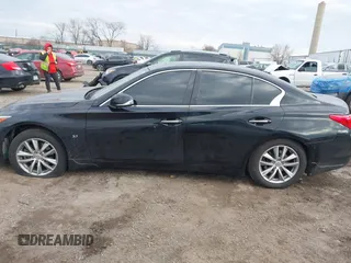 2015 Infiniti Q50 with VIN JN1BV7AR5FM392624, listed as a IAAI auction lot 41667327 with 53,589 mi miles. Bid and sale history available at carsss.com. Image 13.