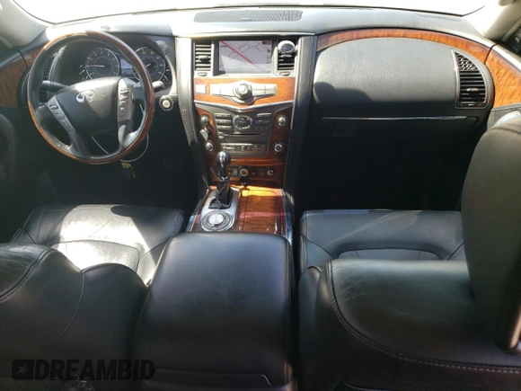 2015 Infiniti QX80 z VIN JN8AZ2NDXF9770443, wystawiony jako Copart lot #49982175 z przebiegiem 255 778 mil mil oraz Czysty tytuł • Clean title. Historia ofert i sprzedaży dostępna na DreamBid. Obrazek 8.