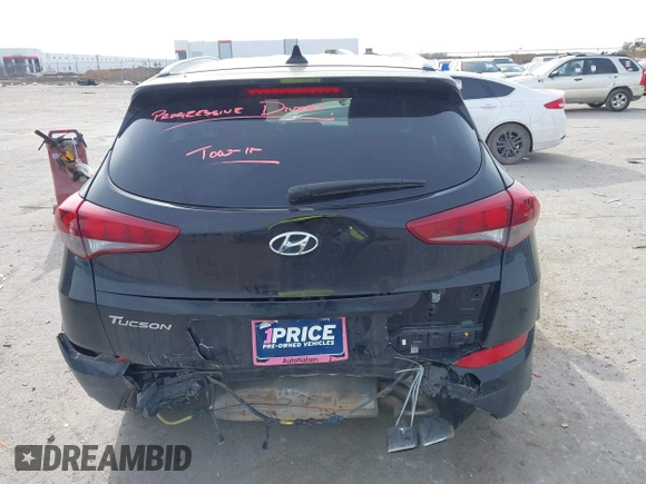 2018 Hyundai Tucson Sport with VIN KM8J33AL7JU772152, listed as a IAAI auction lot 41285203 with 87,188 mi miles. Bid and sale history available at carsss.com. Image 16.