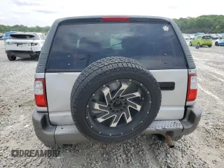 2002 Isuzu Rodeo z VIN 4S2CK57W324328043, wystawiony jako Copart lot #54584025 z przebiegiem 141 523 mil mil oraz Szkody całkowita. Historia ofert i sprzedaży dostępna na DreamBid. Obrazek 6.