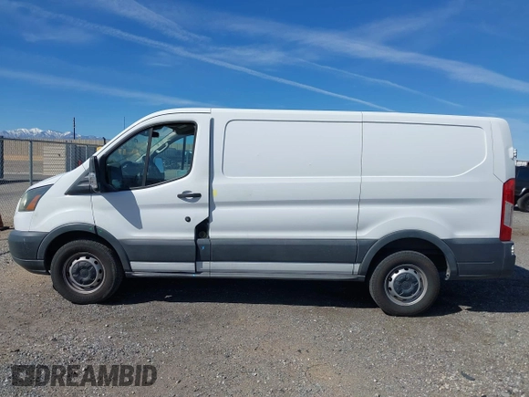 2015 Ford Transit Cargo with VIN 1FTNE1ZM6FKA87497, listed as a IAAI auction lot 41715523 with 180,079 mi miles. Bid and sale history available at carsss.com. Image 14.