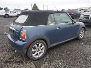 2009 MINI Convertible with VIN WMWMR33519TU96578, listed as a IAAI auction lot 41439278 with 100,070 mi miles and . Bid and sale history available at DreamBid. Image 4.