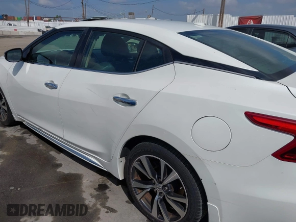 2016 Nissan Maxima S with VIN 1N4AA6AP2GC430689, listed as a IAAI auction lot 41913701 with 132,637 mi miles and . Bid and sale history available at DreamBid. Image 6.