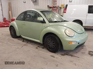 1999 Volkswagen Beetle GLS z VIN 3VWCC21C7XM474752, wystawiony jako IAAI lot #42295187 z przebiegiem 160 303 mil mil oraz . Historia ofert i sprzedaży dostępna na DreamBid. Obrazek 1.