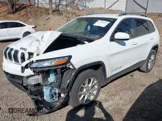 2015 Jeep Cherokee Latitude with VIN 1C4PJMCS7FW503594, listed as a IAAI auction lot 41792820 with 77,325 mi miles. Bid and sale history available at carsss.com. Image 17.