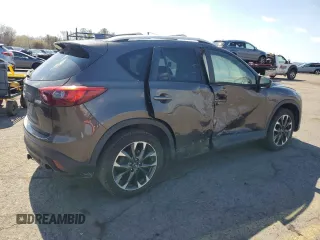 2016 Mazda CX-5 Grand Touring with VIN JM3KE4DY1G0806674, listed as a Copart auction lot 50549465 with 139,753 mi miles and Salvage Title. Bid and sale history available at carsss.com. Image 3.