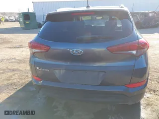 2016 Hyundai Tucson SE with VIN KM8J33A45GU089996, listed as a IAAI auction lot 41687069 with 129,957 mi miles. Bid and sale history available at carsss.com. Image 16.