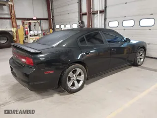2011 Dodge Charger RT Plus with VIN 2B3CL5CT9BH511648, listed as a IAAI auction lot 41734392 with 103,112 mi miles. Bid and sale history available at carsss.com. Image 4.