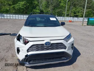 2021 Toyota RAV4 Hybrid XSE with VIN JTME6RFV4MJ008825, listed as a IAAI auction lot 42060148 with 91,129 mi miles and . Bid and sale history available at DreamBid. Image 12.