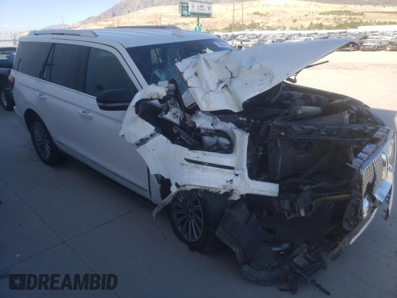 2020 Lincoln Navigator with VIN 5LMJJ2NT0LEL07488, listed as a Copart auction lot 73396634 with Not provided miles and Salvage title. Bid and sale history available at DreamBid. Image 4.