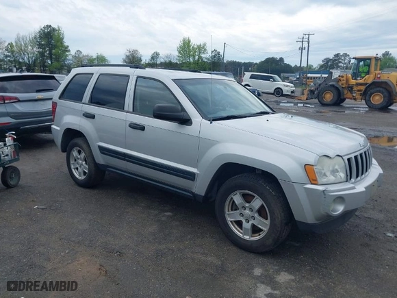 2005 Jeep Grand Cherokee Laredo with VIN 1J4GS48K75C644259, listed as a IAAI auction lot 42044878 with 250,841 mi miles. Bid and sale history available at carsss.com. Image 1.