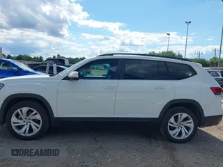 2021 Volkswagen Atlas SE z VIN 1V2WR2CA9MC585700, wystawiony jako IAAI lot #42234502 z przebiegiem 46 040 mil mil oraz . Historia ofert i sprzedaży dostępna na DreamBid. Obrazek 14.