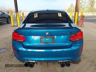 2018 BMW M2 z VIN WBS1J5C59JVA12718, wystawiony jako IAAI lot #41796602 z przebiegiem 53 707 mil mil oraz . Historia ofert i sprzedaży dostępna na DreamBid. Obrazek 17.