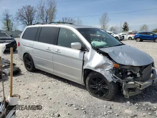 2010 Honda Odyssey Touring with VIN 5FNRL3H96AB061424, listed as a Copart auction lot 54479015 with 200,373 mi miles and Clean Title. Bid and sale history available at carsss.com. Image 4.