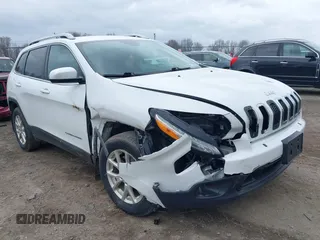 2017 Jeep Cherokee Latitude with VIN 1C4PJMCB3HW530794, listed as a IAAI auction lot 41854670 with 103,798 mi miles. Bid and sale history available at carsss.com. Image 1.
