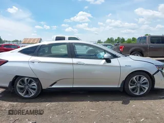 2018 Honda Clarity z VIN JHMZC5F14JC007026, wystawiony jako IAAI lot #42361556 z przebiegiem 74 132 mil mil oraz . Historia ofert i sprzedaży dostępna na DreamBid. Obrazek 13.