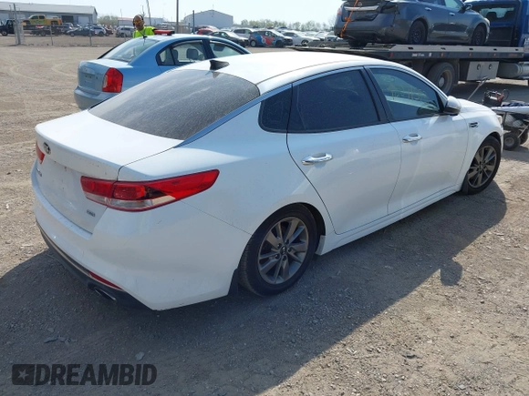 2016 Kia Optima LX Turbo with VIN 5XXGT4L10GG037107, listed as a IAAI auction lot 42071593 with 152,919 mi miles. Bid and sale history available at carsss.com. Image 4.