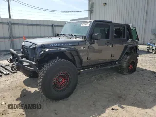 2016 Jeep Wrangler Unlimited Rubicon with VIN 1C4BJWFG8GL192077, listed as a Copart auction lot 58339005 with 62,076 mi miles and Salvage title. Bid and sale history available at DreamBid. Image 1.