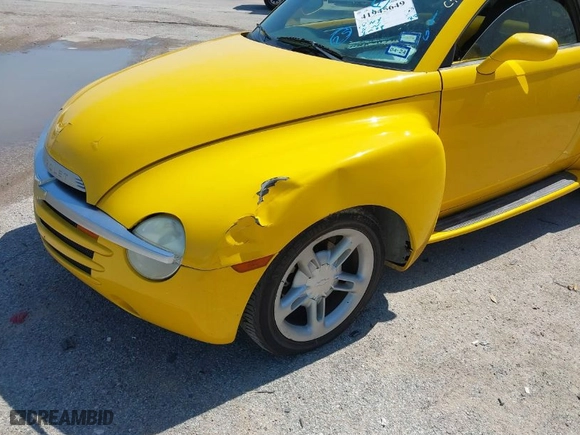 2004 Chevrolet SSR LS with VIN 1GCES14P54B108959, listed as a IAAI auction lot 41945649 with 129,202 mi miles. Bid and sale history available at carsss.com. Image 6.