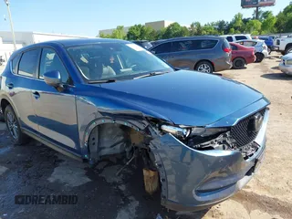 2020 Mazda CX-5 Touring z VIN JM3KFBCM2L0848233, wystawiony jako IAAI lot #42189719 z przebiegiem 80 893 mil mil oraz . Historia ofert i sprzedaży dostępna na DreamBid. Obrazek 6.