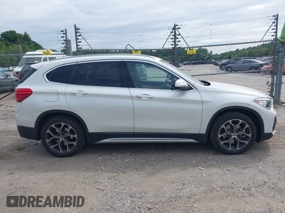 2021 BMW X1 xDrive28i with VIN WBXJG9C07M5U21337, listed as a IAAI auction lot 42590859 with 35,934 mi miles and . Bid and sale history available at DreamBid. Image 13.