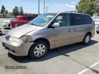 2003 Honda Odyssey EX z VIN 5FNRL18683B099489, wystawiony jako Copart lot #54959535 z przebiegiem 120 279 mil mil oraz Szkoda całkowita • Salvage title. Historia ofert i sprzedaży dostępna na DreamBid. Obrazek 1.