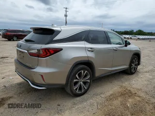 2020 Lexus RX 350L with VIN JTJHZKEA1L2017725, listed as a Copart auction lot 56022175 with 100,463 mi miles and Salvage title. Bid and sale history available at DreamBid. Image 3.