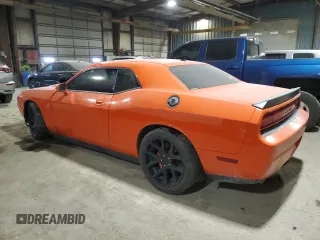 2010 Dodge Challenger SRT-8 with VIN 2B3CJ7DW3AH260635, listed as a Copart auction lot 87880775 with 105,524 mi miles and Salvage title. Bid and sale history available at DreamBid. Image 2.