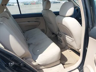 2007 Kia Rondo LX with VIN KNAFG525877029532, listed as a IAAI auction lot 42036604 with 225,698 mi miles. Bid and sale history available at carsss.com. Image 8.