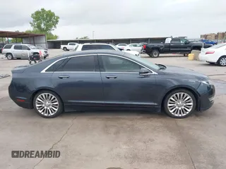 2014 Lincoln MKZ z VIN 3LN6L2G98ER830388, wystawiony jako IAAI lot #42104116 z przebiegiem 108 219 mil mil oraz . Historia ofert i sprzedaży dostępna na DreamBid. Obrazek 14.