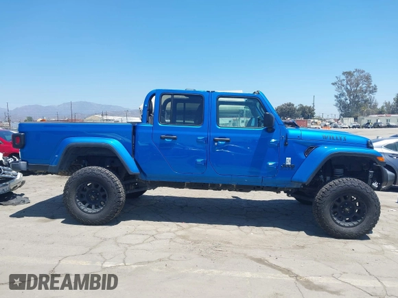 2022 Jeep Gladiator Texas Trail with VIN 1C6HJTAG4NL135346, listed as a IAAI auction lot 42824733 with 40,126 mi miles and . Bid and sale history available at DreamBid. Image 13.