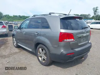 2012 Kia Sorento EX with VIN 5XYKUDA64CG255711, listed as a IAAI auction lot 42625704 with 149,625 mi miles and . Bid and sale history available at DreamBid. Image 3.