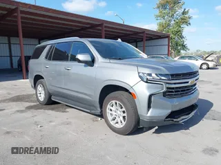 2023 Chevrolet Tahoe LT z VIN 1GNSKNKD0PR316432, wystawiony jako IAAI lot #42163185 z przebiegiem 66 293 mil mil oraz . Historia ofert i sprzedaży dostępna na DreamBid. Obrazek 1.