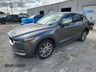 2019 Mazda CX-5 Grand Touring with VIN JM3KFADM2K1637664, listed as a Copart auction lot 63400975 with 45,663 mi miles and Salvage title. Bid and sale history available at DreamBid. Image 1.