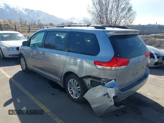 2011 Toyota Sienna XLE AAS with VIN 5TDYK3DC4BS014986, listed as a IAAI auction lot 41763681 with 169,619 mi miles. Bid and sale history available at carsss.com. Image 3.