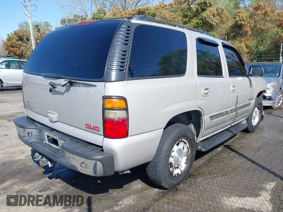 2005 GMC Yukon SLT with VIN 1GKEK13T25J251782, listed as a IAAI auction lot 41916555 with 262,546 mi miles. Bid and sale history available at carsss.com. Image 4.