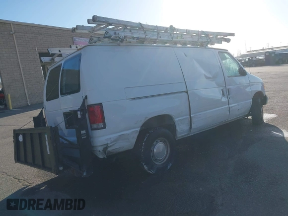 2000 Ford Econoline Cargo with VIN 1FTRE1427YHA09155, listed as a IAAI auction lot 41544236 with 32,275 mi miles. Bid and sale history available at carsss.com. Image 4.