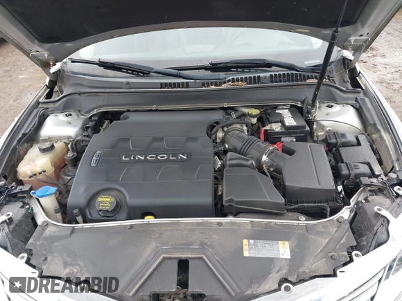 2013 Lincoln MKZ с VIN 3LN6L2GK0DR823324, выставлен на аукционе IAAI как лот 41954237 с пробегом 135 077 миль миль и . История ставок и продаж доступна на DreamBid. Изображение 10.