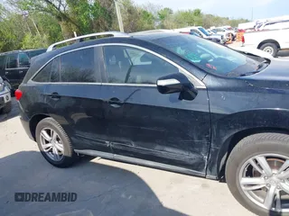 2014 Acura RDX Technology with VIN 5J8TB3H55EL001838, listed as a IAAI auction lot 41876530 with 214,266 mi miles and . Bid and sale history available at DreamBid. Image 14.
