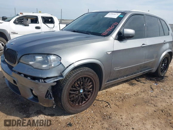 2012 BMW X5 50i with VIN 5UXZV8C56CL426081, listed as a IAAI auction lot 42084071 with 135,473 mi miles and . Bid and sale history available at DreamBid. Image 2.