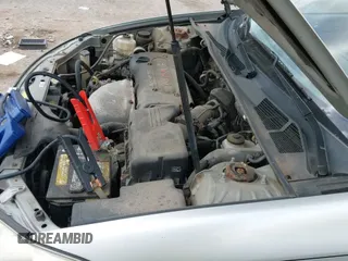 2005 Toyota Camry STD z VIN 4T1BE32K25U977288, wystawiony jako IAAI lot #43267344 z przebiegiem 265 706 mil mil oraz . Historia ofert i sprzedaży dostępna na DreamBid. Obrazek 19.