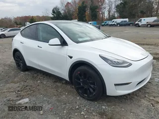 2020 Tesla Model Y Long Range z VIN 5YJYGDEE3LF049077, wystawiony jako IAAI lot #40853688 z przebiegiem 29 065 mil mil oraz . Historia ofert i sprzedaży dostępna na DreamBid. Obrazek 1.