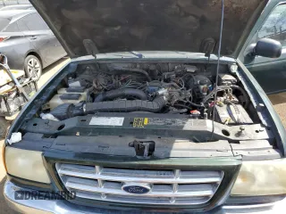 2001 Ford Ranger XL z VIN 1FTYR14V21PB49944, wystawiony jako Copart lot #54184925 z przebiegiem 305 117 mil mil oraz Szkoda całkowita • Salvage title. Historia ofert i sprzedaży dostępna na DreamBid. Obrazek 11.
