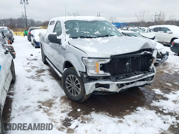2018 Ford F-150 XL with VIN 1FTFW1E54JKC59793, listed as a IAAI auction lot 41558134 with 217,831 mi miles. Bid and sale history available at carsss.com. Image 1.