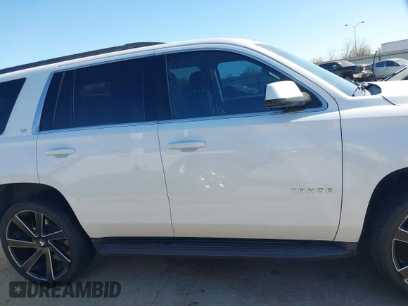 2015 Chevrolet Tahoe LS with VIN 1GNSCAKCXFR748554, listed as a IAAI auction lot 41765865 with 160,282 mi miles and . Bid and sale history available at DreamBid. Image 13.