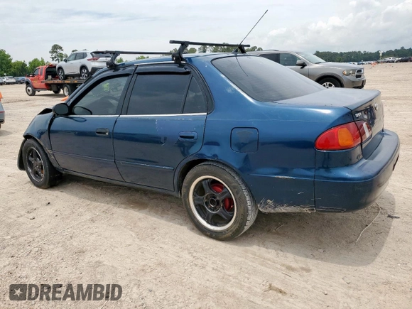 1998 Toyota Corolla VE with VIN 2T1BR18E6WC072503, listed as a Copart auction lot 58751795 with 306,052 mi miles and Salvage title. Bid and sale history available at DreamBid. Image 2.
